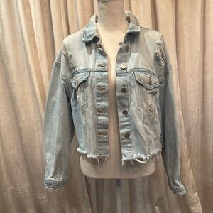 Distressed denim jacket